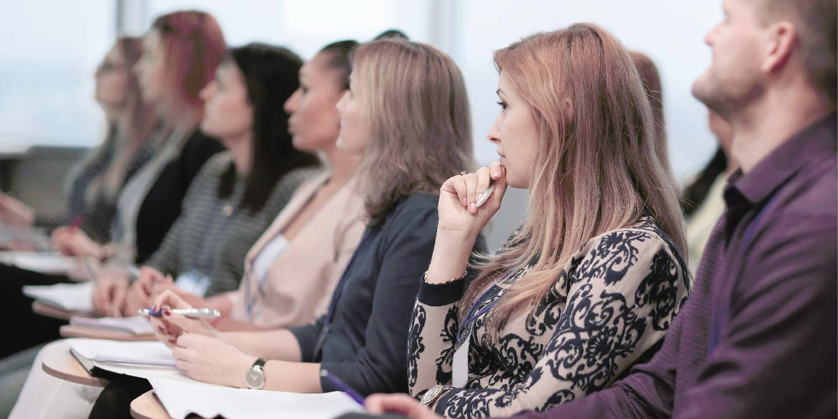 audience-business-conference-people-listening-lecture lower res for web.jpg