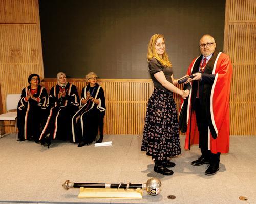 Dr Sally Ashton receiving her award at the New Fellows Ceremony in February