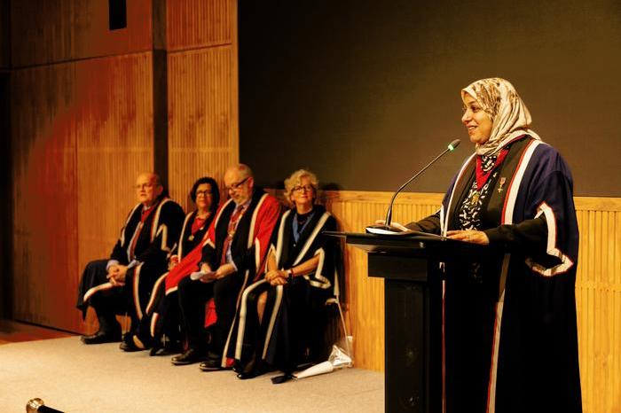 Dr Noha El Sakka, Vice President of Communications, addresses attendees of the New Fellows Ceremony