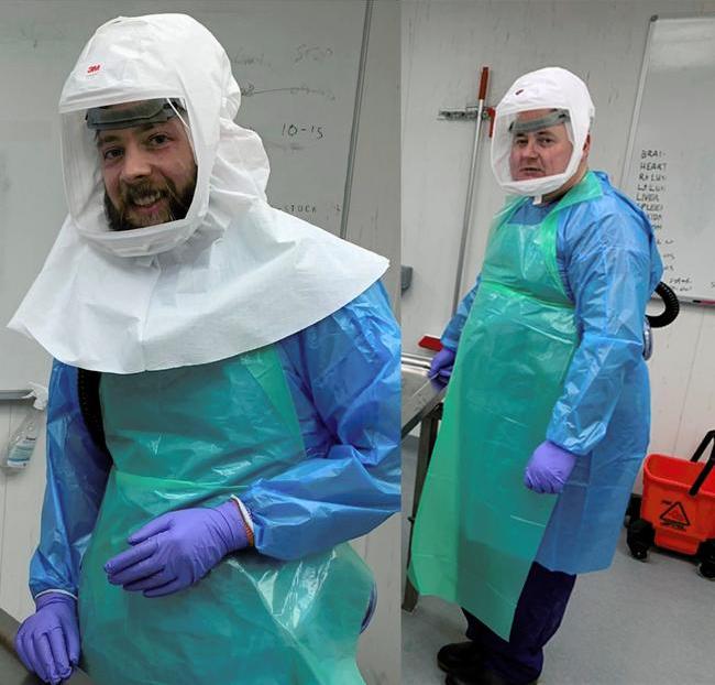 Dr Brian Hanley (left) and Dr Mike Osborn (right) needed to wear personal protective equipment to undertake autopsies safely.